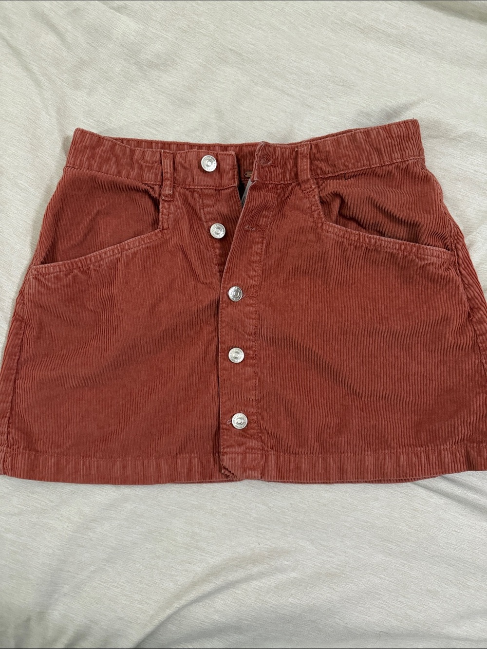 One People Button-Front Mini Skirt in Rust Corduroy